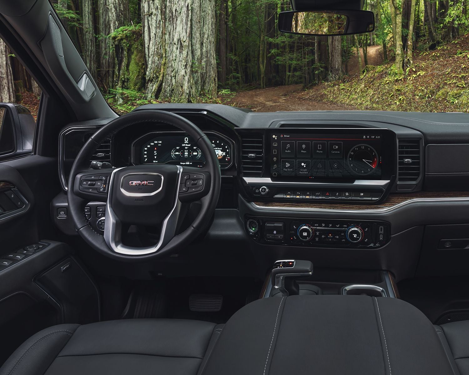 Interior dashboard shot of the 2025 GMC Sierra 1500.