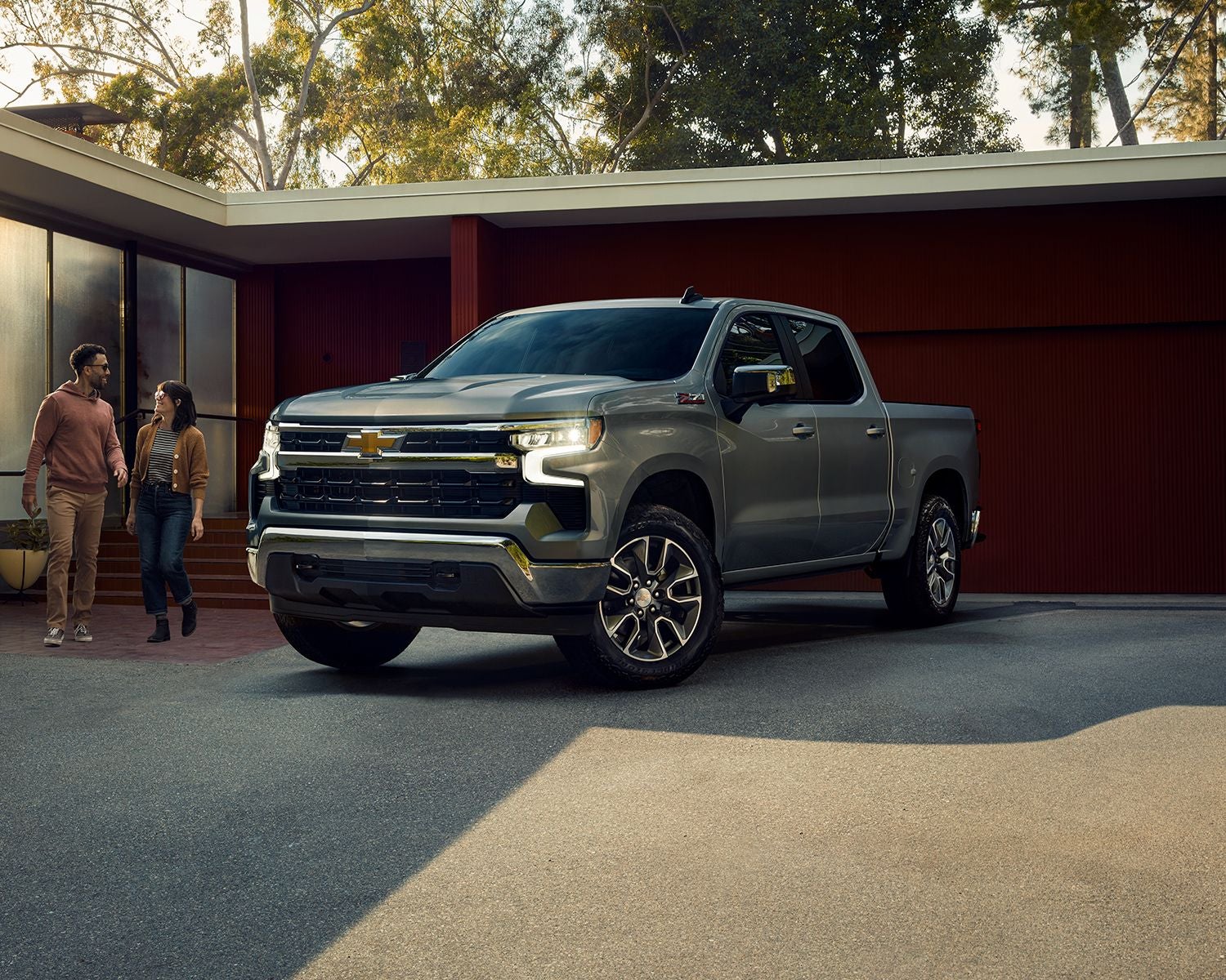 Front 3/4 shot of the 2025 Chevrolet Silverado 1500 parked in driveway of home.