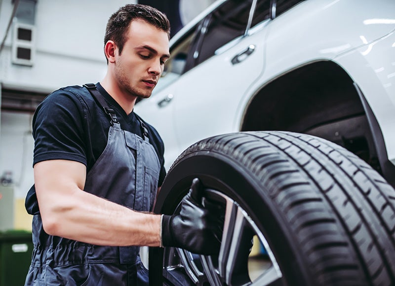 Mechanic working on a tire